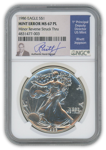 1986 Silver Eagle - Business Strike - Strike Through Error - NGC MS67PL Prooflike Jeppson Label