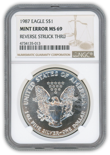 1987 Silver Eagle - Business Strike - Major Struck Through - NGC 69