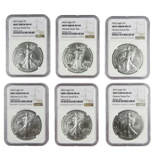 Grab Bag - NGC Certified Silver Eagle Struck Through Errors